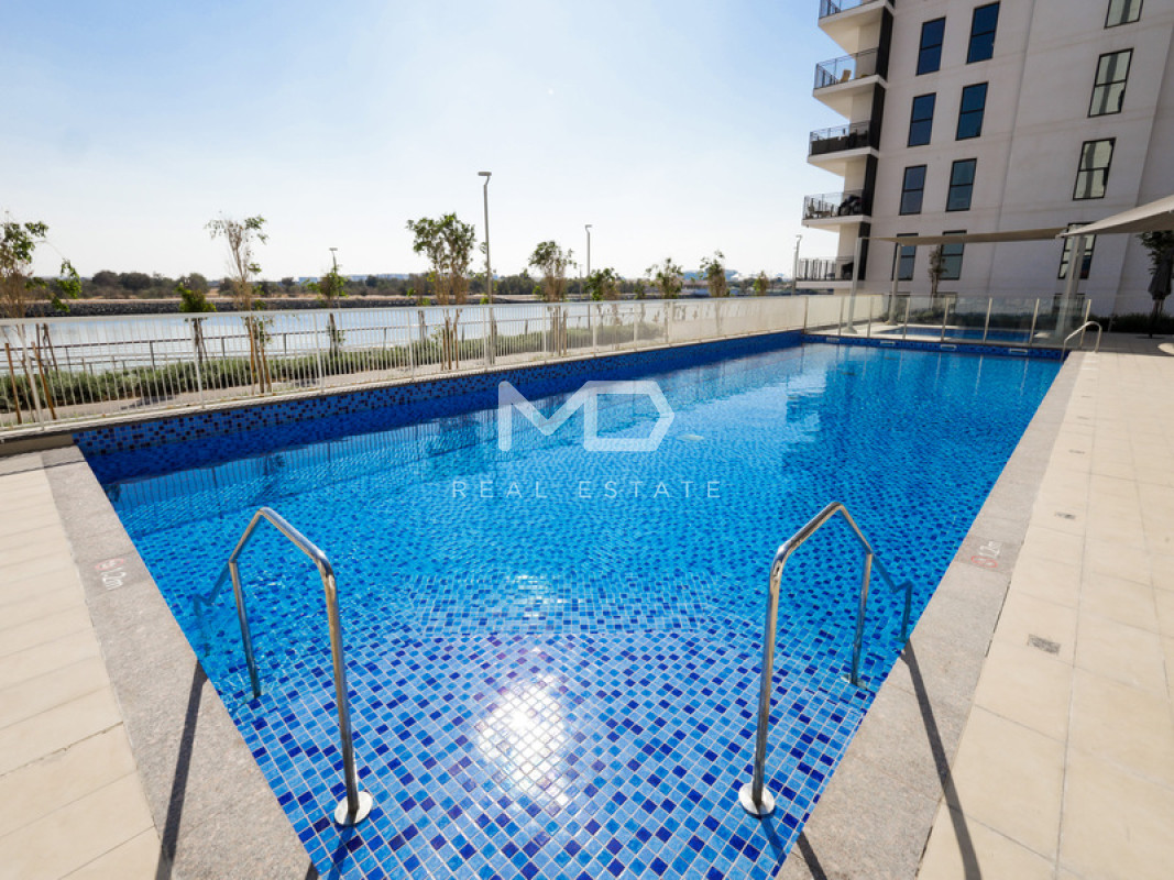 Partial Canal View | On High Floor | All Amenities in Waters Edge